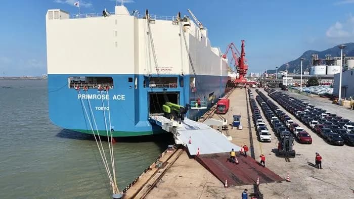 New cars queuing to drive onto a Ro-Ro vessel